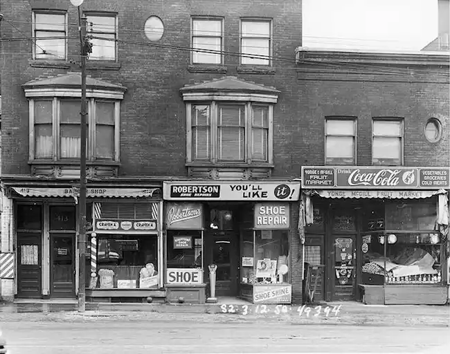 Historical image of Retail stores on Yonge Street, circa 1950. City of Toronto Archives series 574.